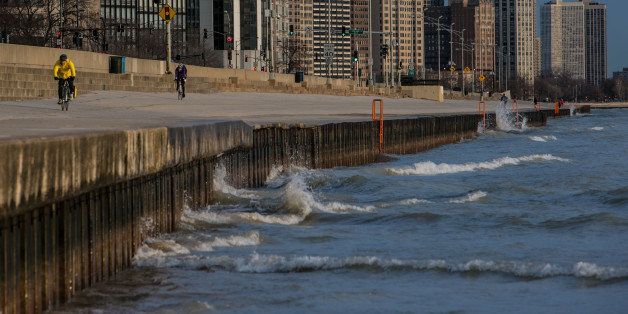 CHICAGO, IL - MARCH 26: The wind whips up small waves near Lake Michigan's Lakeshore Drive bike path at Ohio Street Beach on March 26, 2013 in Chicago, Illinois. Visitors to the Windy City, the third most populous city in the United States, have had to bundle up due to an unusually cold spring. (Photo by George Rose/Getty Images)