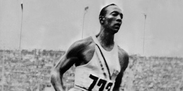 US champion 'Jesse' (James Cleveland) Owens crosses the finish line of the 200m event, that he won, 05 August 1936 during Oly