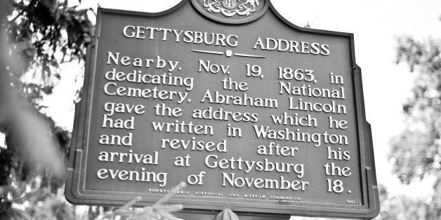 [UNVERIFIED CONTENT] Historic site signage by the Gettysburg Cemetery in rural Pennsylvania. Wording reads 'Nearby. Nov. 19 1863. in dedicating the National Cemetery. Abraham Lincoln gave the address which he had written in Washington and revised after his arrival at Gettysburg the evening of November 18.