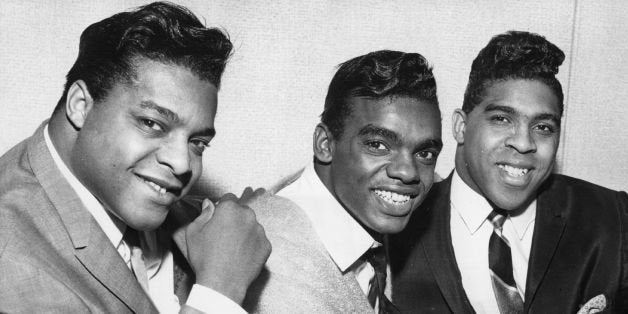 circa 1964: American soul vocal pop group the Isley Brothers (left to right) O'Kelly Isley Jnr, Ronnie Isley and Rudolph Isley, in Britain to tour. (Photo by Evening Standard/Getty Images)