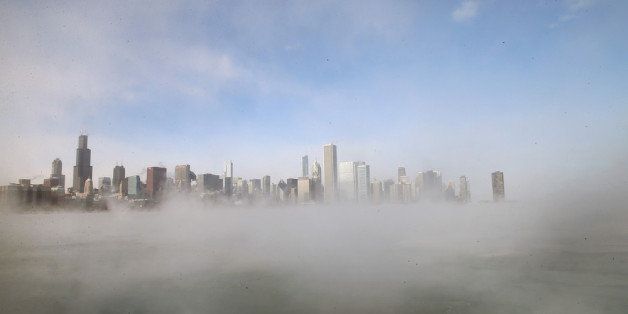 CHICAGO, IL - JANUARY 06: Mist rises from Lake Michigan as temperatures dipped well below zero on January 6, 2014 in Chicago, Illinois. Chicago hit a record low of -16 degree Fahrenheit this morning as a polar air mass brought the coldest temperatures in about two decades into the city. (Photo by Scott Olson/Getty Images)
