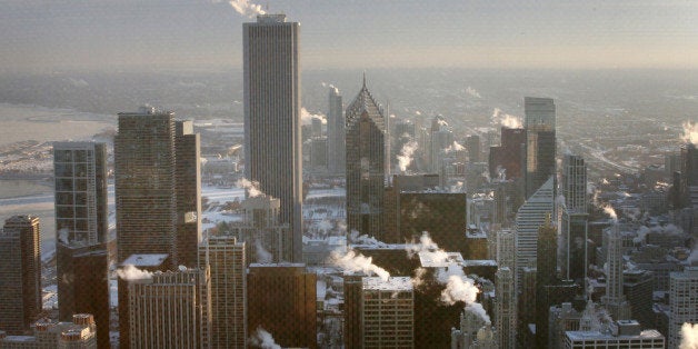 CHICAGO, IL - JANUARY 07: Steam rises from downtown buildings as temperature begin to climb above zero for the first time in