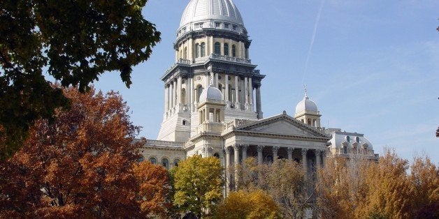 The Illinois State Capitol Building as seen looking west from the grounds of the Illinois Supreme Court Building. This State Capitol Building houses the offices of the Governor, Lt. Governor, Attorney General, Secretary of State, Comptroller, and Treasurer, as well as the House of Representatives and Senate Chambers. The State General Assembly first met here in 1877, although parts of the building remained under construction until 1888. At 361 feet, the Illinois State Capitol Building is the tallest of all domed capitols in the United States.