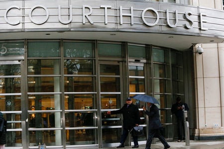 Attorneys for Joaquin "El Chapo" Guzman arrive Monday at the federal courthouse in Brooklyn, New York.