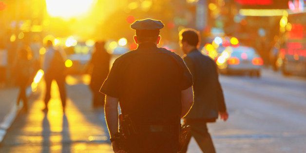Police officer at sunset in New York City