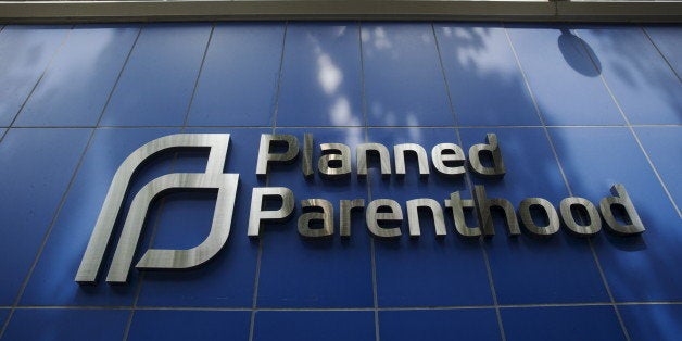 A sign is pictured at the entrance to a Planned Parenthood building in New York August 31, 2015. Picture taken August 31, 2015. To match Insight USA-PLANNEDPARENTHOOD/ REUTERS/Lucas Jackson