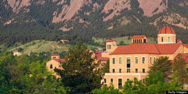The flatirons behind a classroom building on the University of Colorado campus in Boulder Colorado.