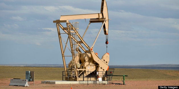 An oil rig in afternoon light in the state of Wyoming.