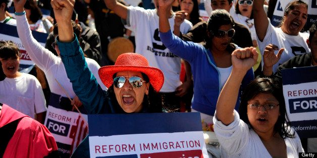 (EL)Martha Granillo of Greeley, front left, and youth, faith leaders, immigrants and allies gathered at Confluence Park in Denver to rally for immigration reform on Sunday. Hyoung Chang/ The Denver Post (Photo By Hyoung Chang/The Denver Post via Getty Images)