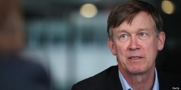 John Hickenlooper, governor of Colorado, speaks during an interview in Washington, D.C., U.S., on Wednesday, June 19, 2013. 'Were going to regulate the living daylights out of it,' Hickenlooper said speaking about marijuana regulation. Photographer: Julia Schmalz/Bloomberg via Getty Images 