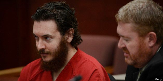 CENTENNIAL, CO - JUNE 04: James Holmes, left, and his defense attorney, Daniel King, in court Tuesday morning June 04, 2013 for an advisement hearing at the Arapahoe County Justice Center. Holmes is accused of killing 12 people and injuring 70 others in a shooting rampage at an Aurora theater, July 20th, 2012. The court accepted James Holmes plea of not guilty by reason of insanity and has ordered a sanity evaluation at the Colorado Mental Health Institute of Pueblo. (Photo By Andy Cross/The Denver Post via Getty Images)