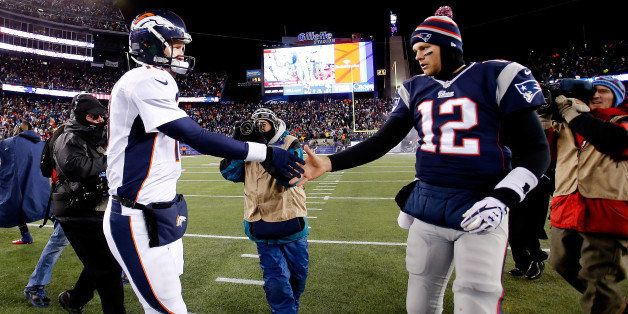 FOXBORO, MA - NOVEMBER 24: Quarterback Peyton Manning #18 of the Denver Broncos and quarterback Tom Brady #12 of the New England Patriots shake hands after the New England Patriots defeated the Denver Broncos 34-31 in overtime at Gillette Stadium on November 24, 2013 in Foxboro, Massachusetts. (Photo by Jim Rogash/Getty Images)