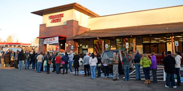 DENVER, CO - FEBRUARY 14: People line up for the grand opening of specialty grocer Trader Joe's located on Colorado Blvd. and East 8th Avenue in Denver, February, 14 2014. Two other Trader Joe's locations in Colorado will also open today. (Photo by RJ Sangosti/The Denver Post via Getty Images)