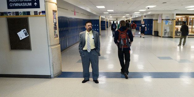 LITTLETON, CO - APRIL 16: Columbine High School Principal Frank DeAngelis watches as students make their way to class, Wednesday, April 16, 2014. DeAngelis plans to retire at the end of the school year. (Photo by RJ Sangosti/The Denver Post via Getty Images)