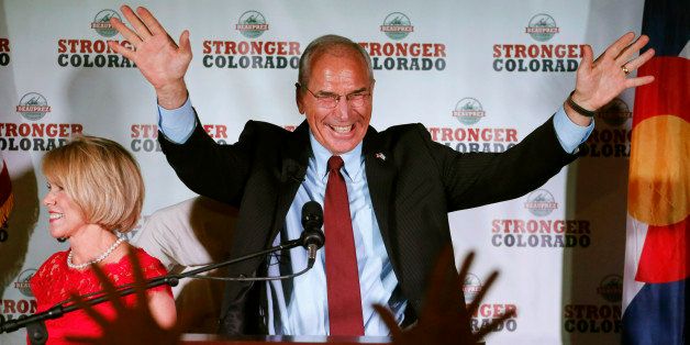 Republican gubernatorial candidate Bob Beauprez celebrates after winning the GOP primary at an election party in Denver on Tuesday, June 24, 2014. His wife Claudia is at left. Beauprez defeated Scott Gessler, Tom Tancredo, and Mike Kopp for the Republican nomination to oppose democratic Gov. John Hickenlooper in November's election. (AP Photo/Ed Andrieski)