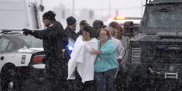 COLORADO SPRINGS, CO - NOVEMBER 27: People are rescued near the scene of a shooting at the Planned Parenthood clinic in Colorado Springs Friday November 27, 2015. (Photo by Andy Cross/The Denver Post via Getty Images)