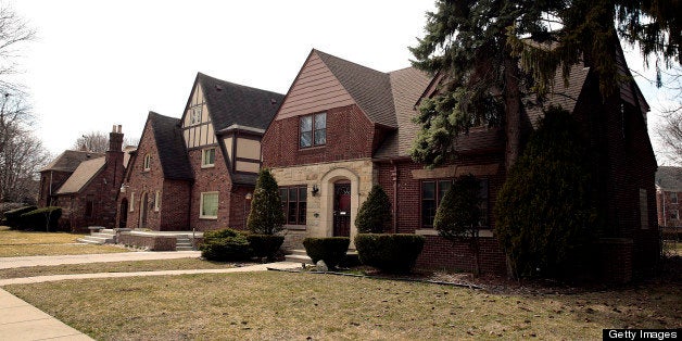 Homes stands on Warwick Street in the North Rosedale Park neighborhood of Detroit, Michigan, U.S., on Monday, April 1, 2013. Flawed appraisals and a dearth of normal, non-foreclosure sales to serve as comparisons have put mortgages out of reach for most potential buyers, even in the best neighborhoods like Grandmont Rosedale that are the focus of officials? efforts to revive Detroit. Photographer: Jeff Kowalsky/Bloomberg via Getty Images