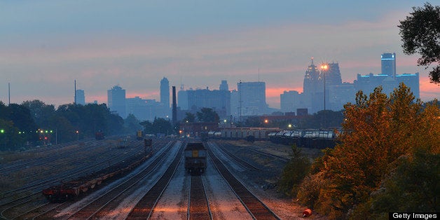 Multiple track lines converge in the foreground and the Detroit syline provides a backdrop. This was taken before dawn in early Fall.