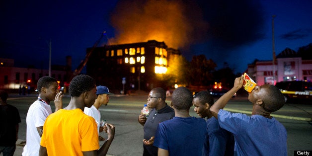 Two abandoned apartment buildings burn on Waverly(no E) Street in the declining Detroit neighbourhood of Highland Park while