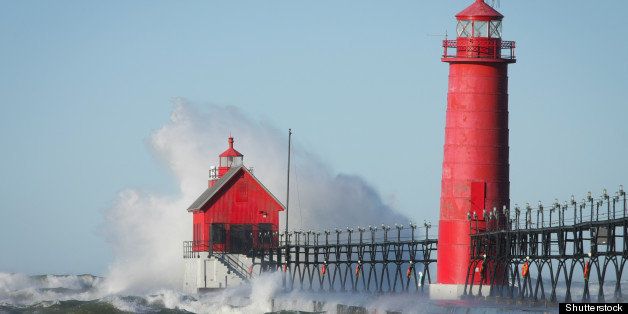 waves crashing on lighthouse....