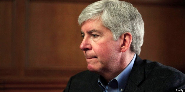 DETROIT, MI - MARCH 1: Michigan Governor Rick Snyder talks with the news media after announcing that he will appoint an Emerg