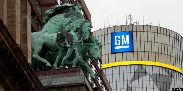 The Renaissance Center, center, the global headquarters of General Motors Co. (GM) stands in Detroit, Michigan, U.S., on Thursday, June 6, 2013. General Motors Co., aiming to increase customer loyalty, announced it will expand its free scheduled maintenance program to most 2014 Chevrolet, Buick and GMC vehicles in the U.S. Photographer: Jeff Kowalsky/Bloomberg via Getty Images