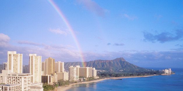 Hawaii, Oahu, Diamond head Waikiki beach, with rainbow and hotels along water