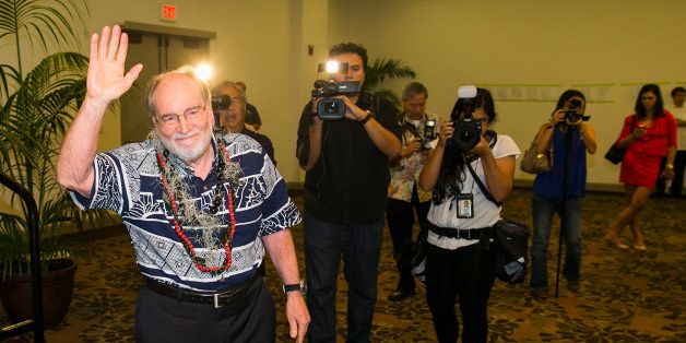 Hawaii Gov. Neil Abercrombie, center, waves to the crowds at the Democratic Unity Breakfast, Sunday, Aug. 10, 2014 in Honolulu. The breakfast is traditionally held after Hawaii elections and is attended by both winners as well as losers. Fellow Democrat and State Sen. David Ige defeated Abercrombie in a stunning primary-election defeat Saturday. (AP Photo/Marco Garcia)