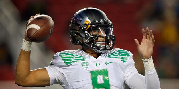 SANTA CLARA, CA - OCTOBER 24: Quarterback Marcus Mariota #8 of the Oregon Ducks throws before a game against the California Golden Bears on October 24, 2014 at Levi's Stadium in Santa Clara, California. Oregon won 59-41. (Photo by Brian Bahr/Getty Images) 