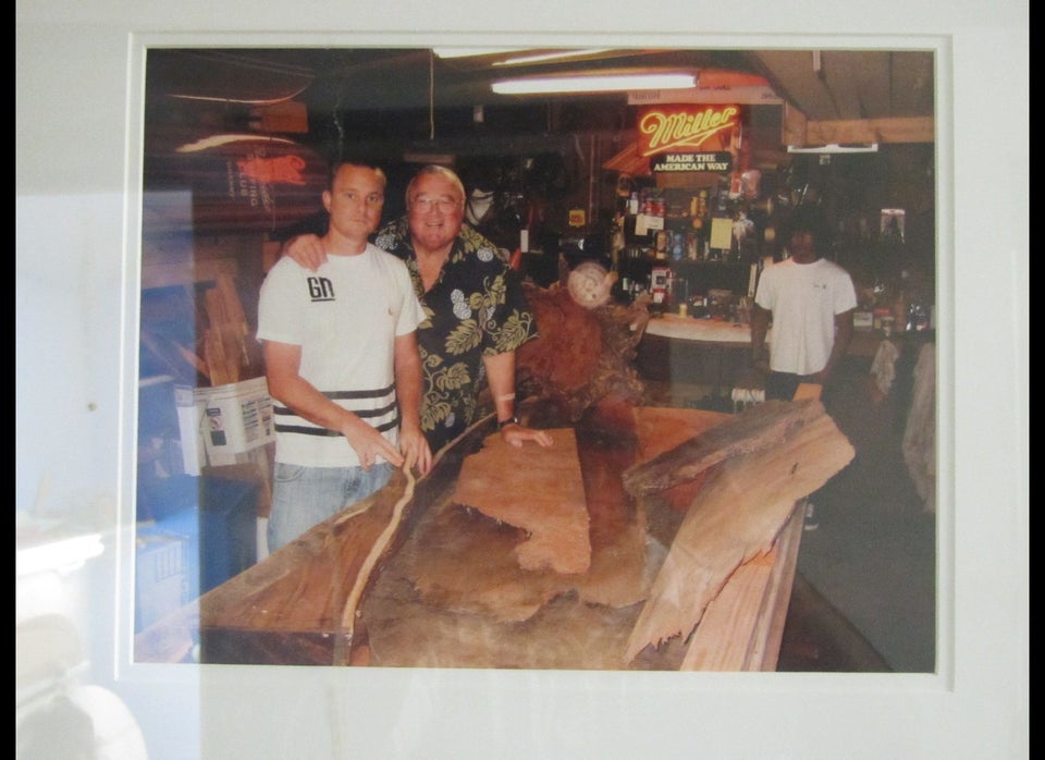 An old photo of Jed and Greg Noll are among many items on display at Noll Surfboards.