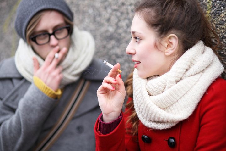 young couple with cigarettes