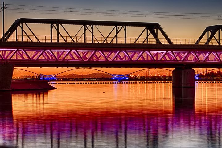 colorful light rail bridge with ...