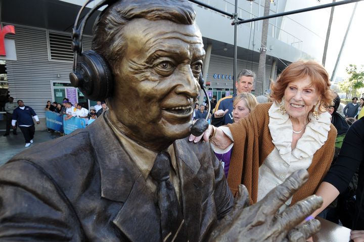LOS ANGELES - APRIL 20: Marge Hearn touches the bronze statue of the late Los Angeles Lakers play-by-play announcer Chick Hearn before Game Two of the Western Conference Quarterfinals between the Oklahoma City Thunder and the Los Angeles Lakers during the 2010 NBA Playoffs at Staples Center on April 20, 2010 in Los Angeles, California. NOTE TO USER: User expressly acknowledges and agrees that, by downloading and/or using this Photograph, user is consenting to the terms and conditions of the Getty Images License Agreement. Mandatory Copyright Notice: Copyright 2010 NBAE (Photo by Andrew D. Bernstein/NBAE via Getty Images)