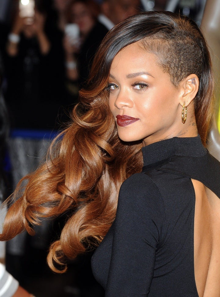 LONDON, UNITED KINGDOM - MARCH 04: Rihanna attends as the Rihanna for River Island collection is launched at the Oxford Stree
