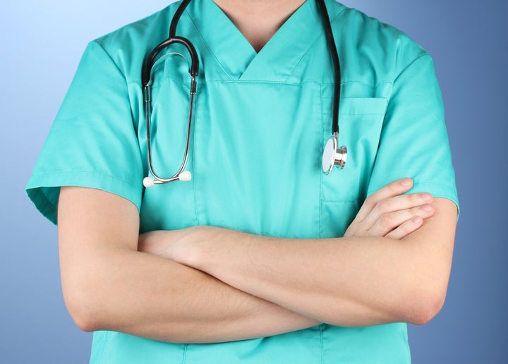 doctor with stethoscope on...
