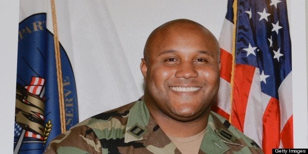 Fired Los Angeles Police Department (LAPD) officer Christopher Dorner seen in an undated photo wearing a military uniform on display at a press conference regarding the manhunt for Dorner, at LADP headquarters in Los Angeles February 7, 2013. Los Angeles police launched a full-scale manhunt for Dorner, a dismissed officer believed to have killed three people including another cop. Christopher Jordan Dorner had posted a chilling online warning about 'terminating' the life of a collegue he blamed for his dismissal, and threatening other police and their families. AFP PHOTOS / ROBYN BECK (Photo credit should read ROBYN BECK/AFP/Getty Images)