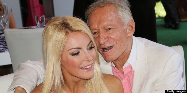 BEVERLY HILLS, CA - MAY 09: Playboy Founder Hugh Hefner (R) and his wife Playboy Playmate Crystal Hefner (L) attend the 2013 Playmate Of The Year announcement at The Playboy Mansion on May 9, 2013 in Beverly Hills, California. (Photo by Paul Archuleta/FilmMagic)
