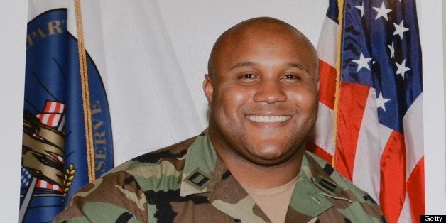 Fired Los Angeles Police Department (LAPD) officer Christopher Dorner seen in an undated photo wearing a military uniform on display at a press conference regarding the manhunt for Dorner, at LADP headquarters in Los Angeles February 7, 2013. Los Angeles police launched a full-scale manhunt for Dorner, a dismissed officer believed to have killed three people including another cop. Christopher Jordan Dorner had posted a chilling online warning about 'terminating' the life of a collegue he blamed for his dismissal, and threatening other police and their families. AFP PHOTOS / ROBYN BECK (Photo credit should read ROBYN BECK/AFP/Getty Images)