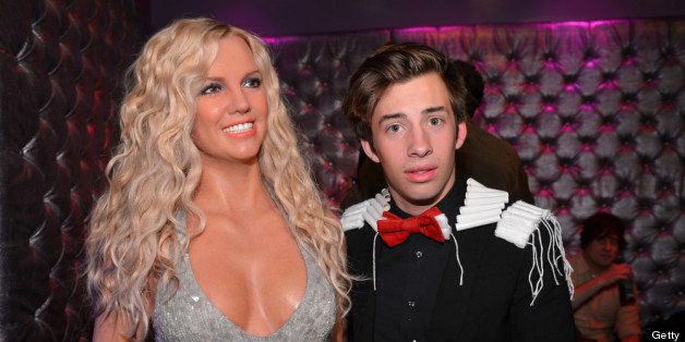 HOLLYWOOD, CA - JANUARY 23: Actor Jimmy Bennett (R) poses with a wax figure of singer Britney Spears as he attends Relativity Media's 'Movie 43' Los Angeles Premiere After Party held at Madame Tussauds Hollywood on January 23, 2013 in Hollywood, California. (Photo by Alberto E. Rodriguez/Getty Images For Relativity Media)
