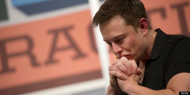 Elon Musk, chief executive officer of Tesla Motors Inc. and Space Exploration Technologies Inc., pauses while speaking during an interview at the South by Southwest Interactive Festival (SXSW) in Austin Texas, U.S., on Saturday, March 9, 2013. Musk said the cells being used in the Boeing Co. 787 Dreamliner lithium-ion batteries are too big, and the gaps too small. Photographer: David Paul Morris/Bloomberg via Getty Images 