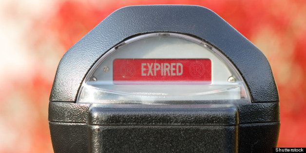 expired sign on parking meter