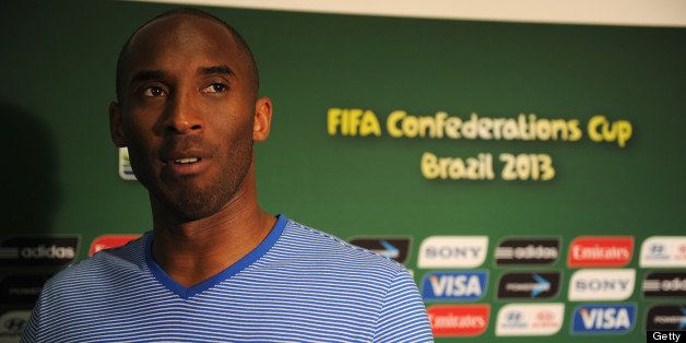 SALVADOR, BRAZIL - JUNE 22: LA Lakers basketball star Kobe Bryant looks on prior to the FIFA Confederations Cup Brazil 2013 Group A match between Italy and Brazil at Estadio Octavio Mangabeira (Arena Fonte Nova Salvador) on June 22, 2013 in Salvador, Brazil. (Photo by Buda Mendes - FIFA/FIFA via Getty Images)