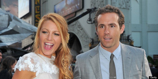 HOLLYWOOD, CA - JUNE 15: Actors Blake Lively (L) and Ryan Reynolds arrive at the premiere of Warner Bros. Pictures' 'Green L