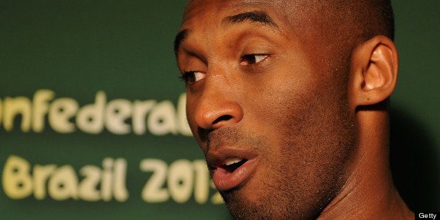 SALVADOR, BRAZIL - JUNE 22: LA Lakers basketball star Kobe Bryant is interviewed prior to the FIFA Confederations Cup Brazil 2013 Group A match between Italy and Brazil at Estadio Octavio Mangabeira (Arena Fonte Nova Salvador) on June 22, 2013 in Salvador, Brazil. (Photo by Buda Mendes - FIFA/FIFA via Getty Images)