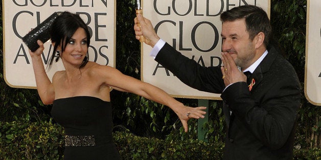Courteney Cox, left, and David Arquette arrives at the at the 67th Golden Globes Awards January 17, 2010, in Beverly Hills,