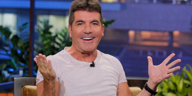 THE TONIGHT SHOW WITH JAY LENO -- Episode 4523 -- Pictured: TV personality Simon Cowell during an interview on September 6, 2013 -- (Photo by: Paul Drinkwater/NBC/NBCU Photo Bank via Getty Images)