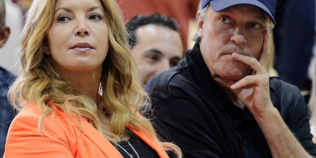 EL SEGUNDO, CA - AUGUST 10: Jim Buss and his sister Jeanie Buss of the Los Angeles Lakers attend a news conference where Dwight Howard was introduced as the newest member of the team at the Toyota Sports Center on August 10, 2012 in El Segundo, California. The Lakers acquired Howard from Orlando Magic in a four-team trade. In addition Lakers will receive Chris Duhon and Earl Clark from the Magic. (Photo by Kevork Djansezian/Getty Images)