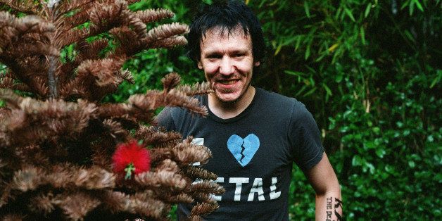 LOS ANGELES, UNITED STATES - MARCH 20: Elliott Smith (1969 - 2003) poses for a portrait session on March 20, 2003 in Los Angeles, California. (Photo by Wendy Redfern/Redferns)