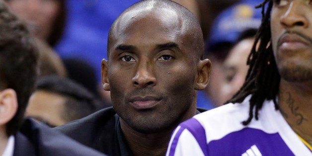 OAKLAND, CA - OCTOBER 30: Kobe Bryant #24 of the Los Angeles Lakers sits on the bench during their game against the Golden State Warriors at ORACLE Arena on October 30, 2013 in Oakland, California. NOTE TO USER: User expressly acknowledges and agrees that, by downloading and or using this photograph, User is consenting to the terms and conditions of the Getty Images License Agreement. (Photo by Ezra Shaw/Getty Images)