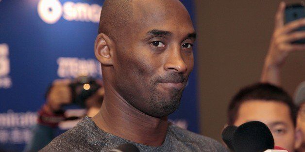 SHANGHAI, CHINA - OCTOBER 17: Kobe Bryant of the Los Angeles Lakers reacts to questions of reporters at NBA Fans Appreciation day on October 17, 2013 in Shanghai, China. (Photo by Kevin Lee/Getty Images)